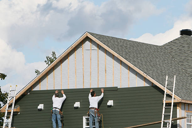 Professional Siding Repair technician working in Hallieford, VA